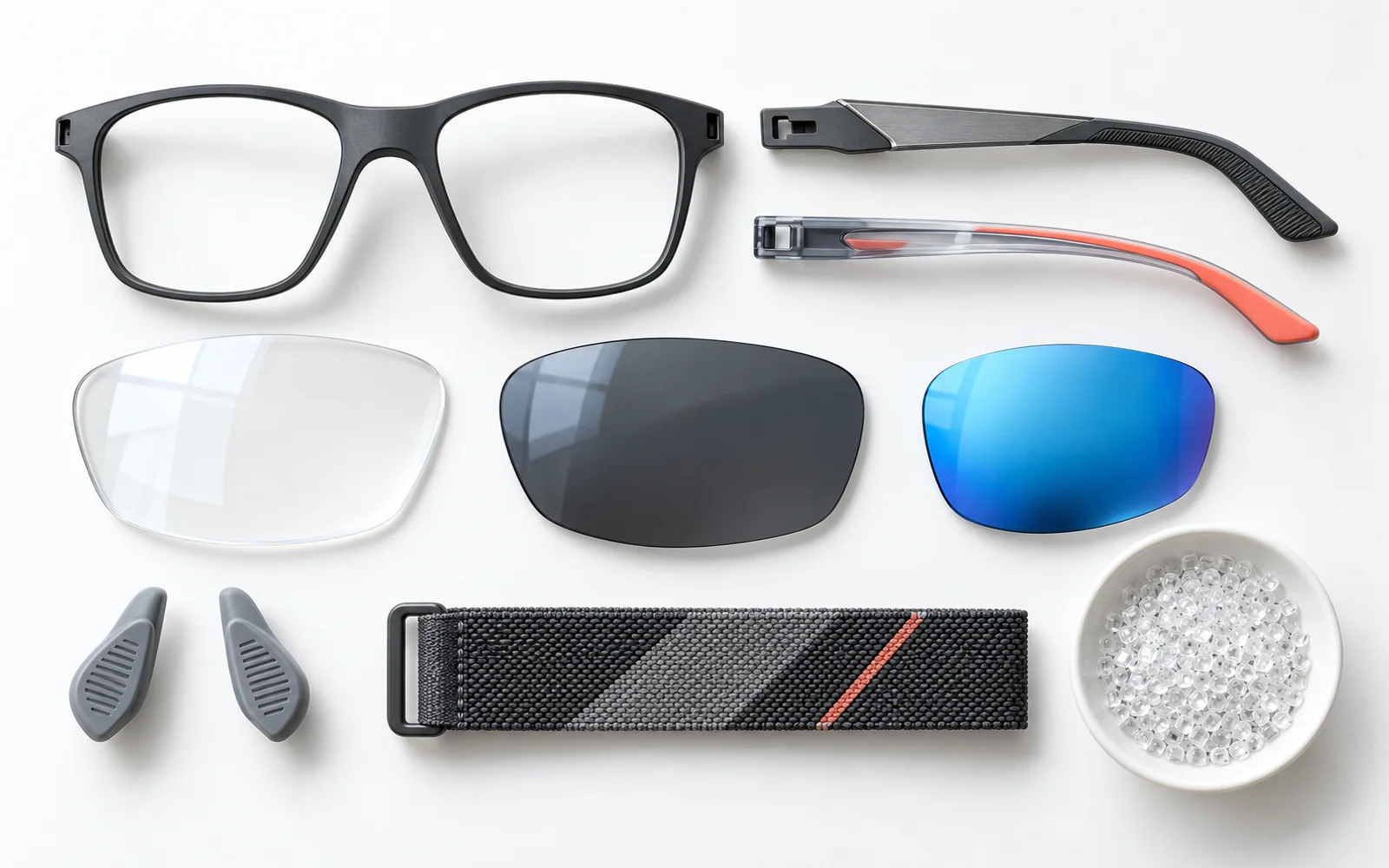 An arranged collection of eyewear frame parts, lens samples and contact components